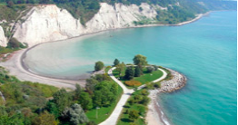 Cliffs bordering a body of water