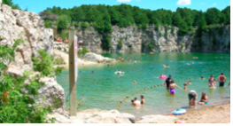 Body of water surrounded by cliffs