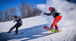 People snowboarding