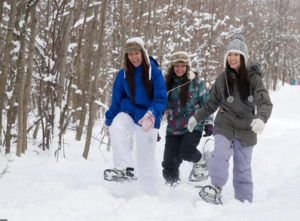 Girls snowshoeing