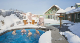 People sitting in outdoor hot tub in winter