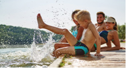 Kids splashing on a dock