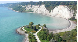 Ariel view of a body of water and cliffs