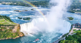 Rainbow going through a waterfall