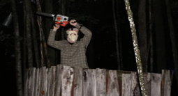 Man Holding a chainsaw