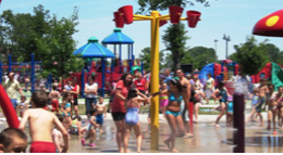 children playing at an outdoor water park