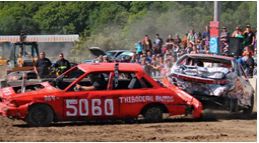 car derby and an audience of people 