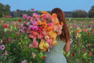 girl holding a bouquet of flowers