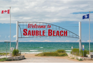 A sign and a beach