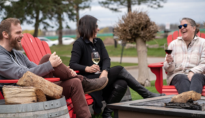 a group of people drinking wine