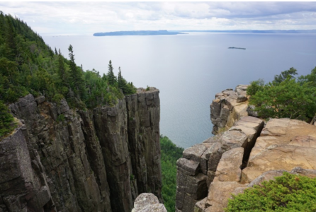 A view of water from the top of a cliff