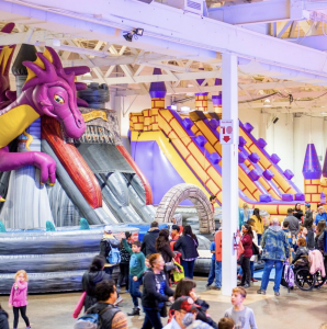 people playing at an amusement park