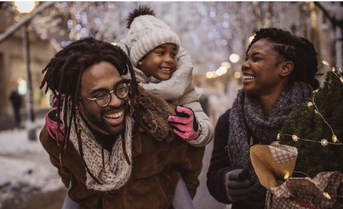 A family outside in the winter